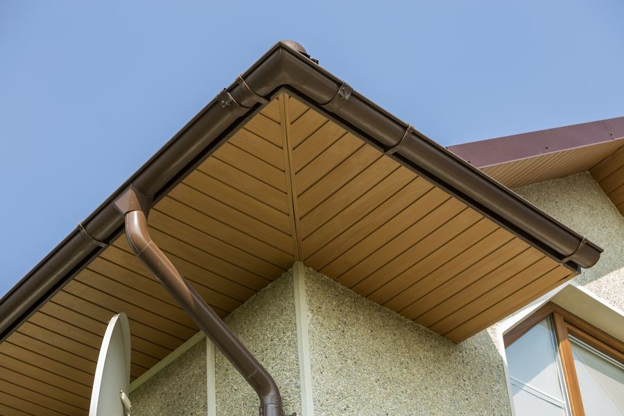 New gutter and downspout on a home