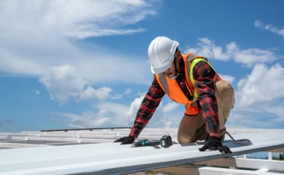 roofing worker installing new roof
